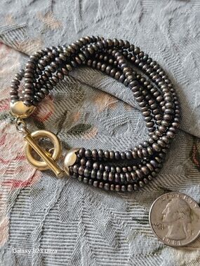 Multi-Strand Black Pearl Bracelet with Gold Toggle Clasp